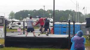 Wrestling in the rain at the campground.